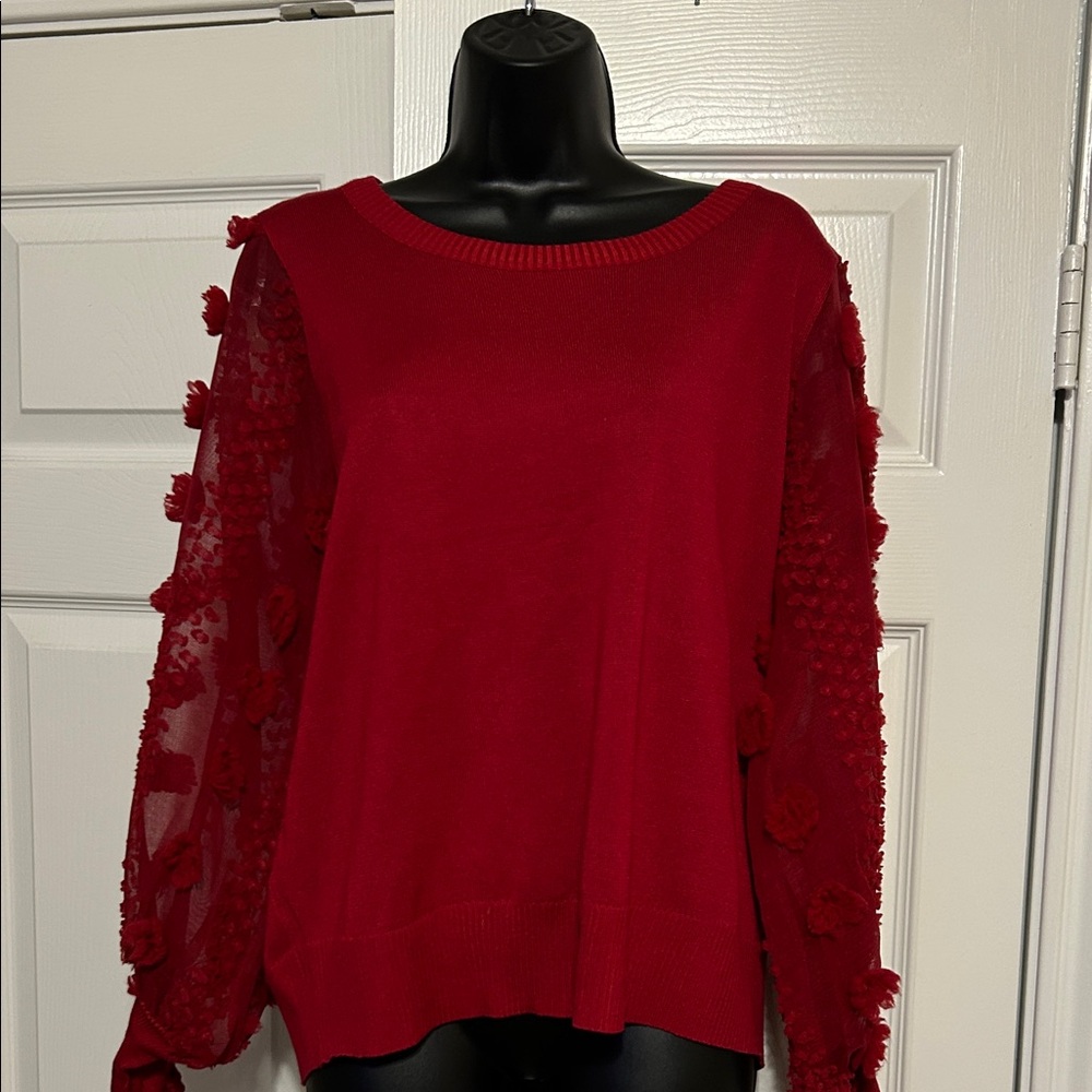 Chic Red Sweater with Floral Sleeves